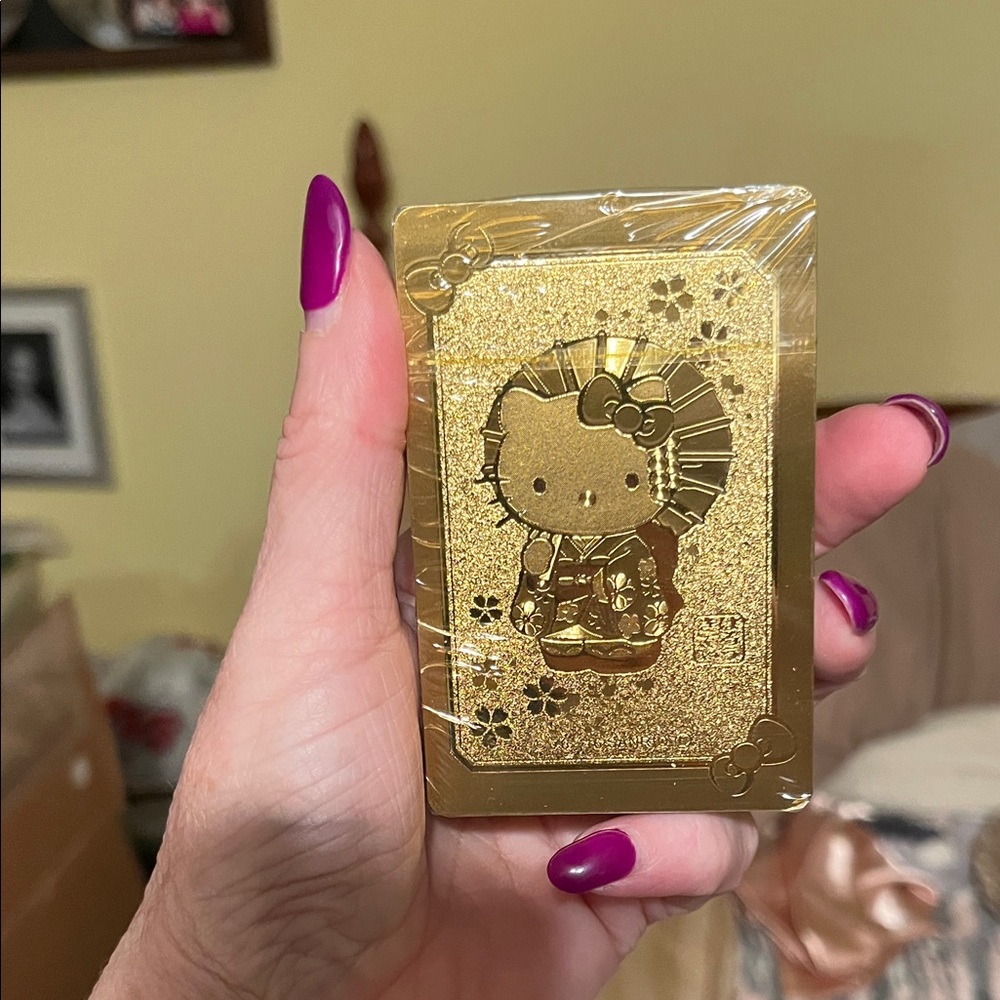 NIB Hello Kitty Gold-Tone Deck of Cards sealed cards in gold tone box